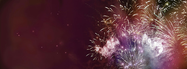 Image showing bright multicolor fireworks banner