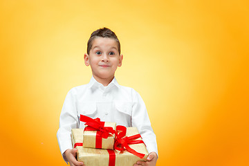 Image showing The boy with gift box