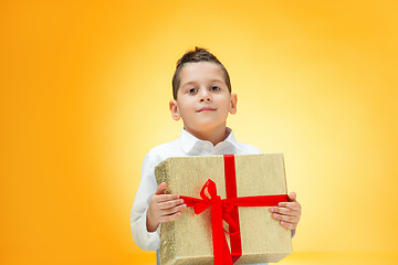 Image showing The boy with gift box