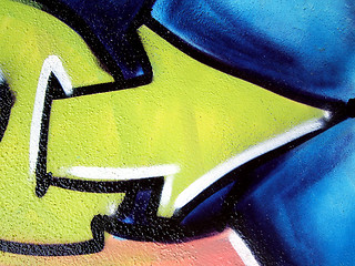 Image showing Yellow graffiti arrow