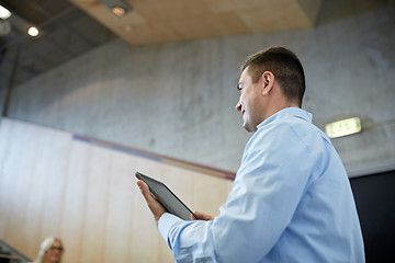 Image showing teacher with tablet pc at lecture hall