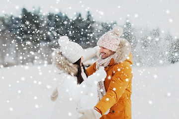 Image showing happy couple hugging and laughing in winter