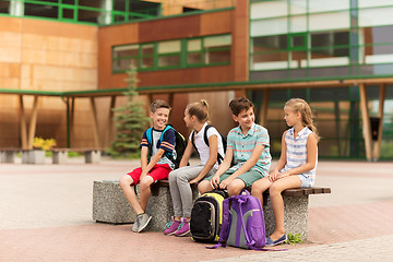 Image showing group of happy elementary school students talking