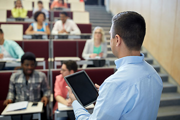 Image showing teacher with tablet pc and students at lecture