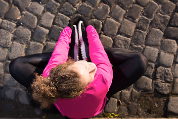 Image showing woman  stretching before morning jogging