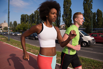 Image showing multiethnic group of people on the jogging