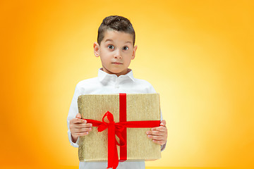 Image showing The boy with gift box
