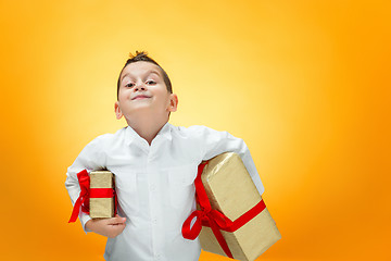 Image showing The boy with gift box