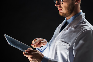 Image showing close up of doctor or scientist with tablet pc