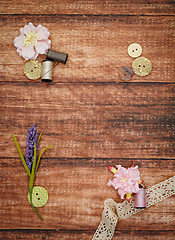 Image showing Lace and thread on wooden background