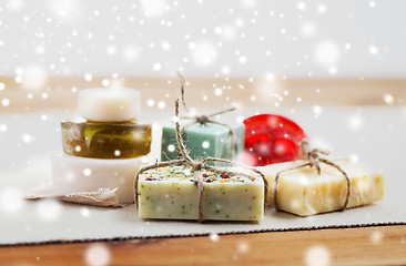 Image showing handmade soap bars on wood