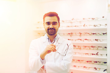 Image showing man optician with glasses in coat at optics store