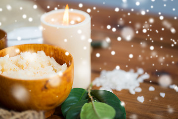 Image showing natural body scrub and candle on wood