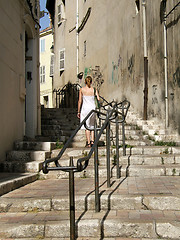 Image showing Woman climbing stairs