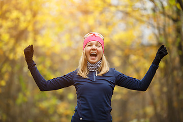 Image showing Girl in sportswear doing exercises