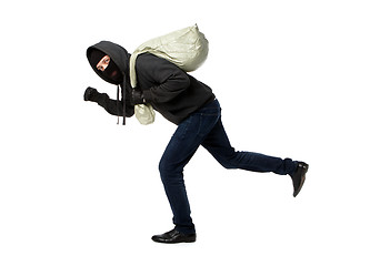 Image showing Thief in jacket with hood