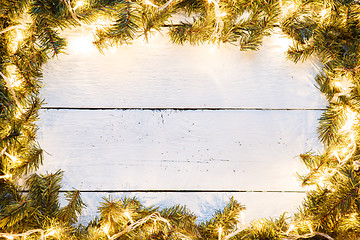 Image showing Festive wooden light background for Christmas or new year