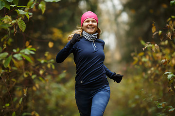 Image showing Blonde woman running in morning