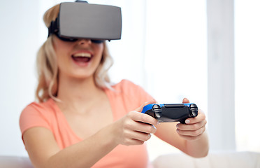 Image showing woman in virtual reality headset with controller