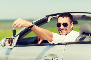 Image showing happy man in cabriolet showing car key