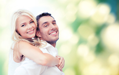 Image showing happy couple having fun over poppy flowers field