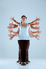 Image showing Group of men and women dancing hip hop choreography