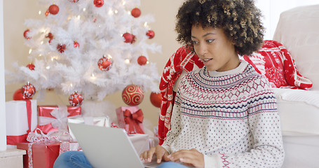 Image showing Excited young woman making a surprise find