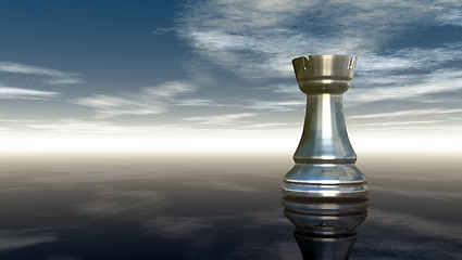 Image showing metal chess rook under cloudy sky - 3d rendering