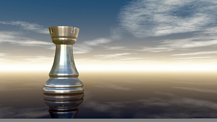 Image showing metal chess rook under cloudy sky - 3d rendering