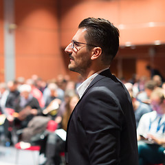 Image showing Public speaker giving talk at Business Event.