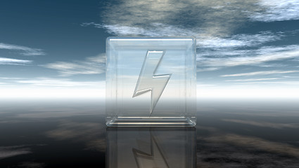 Image showing flash symbol in glass cube under cloudy sky - 3d rendering