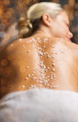 Image showing close up of woman having salt massage in spa