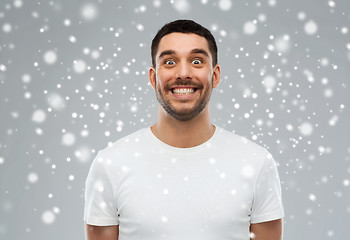 Image showing man with funny face over snow