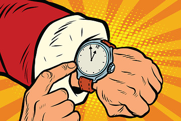 Image showing Santa Claus shows the clock, nearly midnight