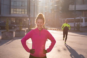 Image showing woman  stretching before morning jogging