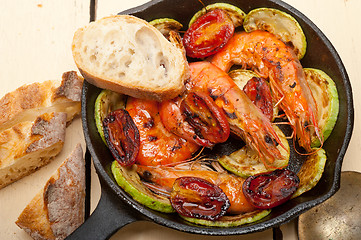 Image showing roasted shrimps with zucchini and tomatoes