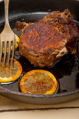 Image showing pork chop seared on iron skillet