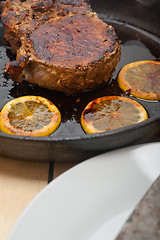 Image showing pork chop seared on iron skillet