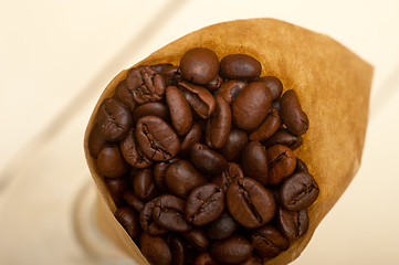 Image showing espresso coffee beans on a paper cone