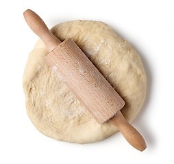 Image showing fresh raw dough and rolling pin