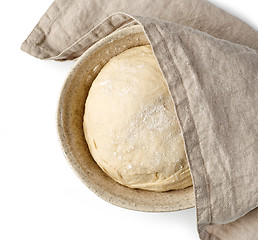 Image showing bowl of dough and linen towel