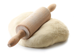 Image showing fresh dough and rolling pin