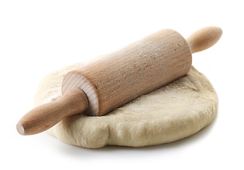 Image showing fresh dough and rolling pin