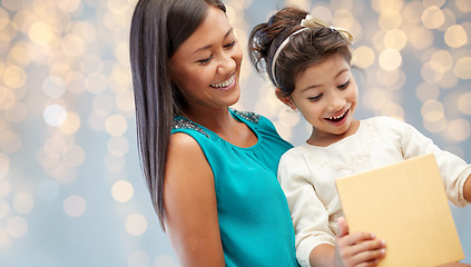 Image showing happy mother and child girl with gift box