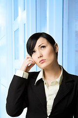 Image showing Thinking businesswoman