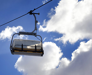 Image showing Chair-lift and sunlight sky