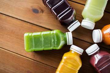 Image showing bottles with different fruit or vegetable juices