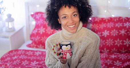 Image showing Happy young woman relaxing at Christmas