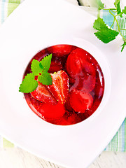 Image showing Jelly strawberry with mint on table top