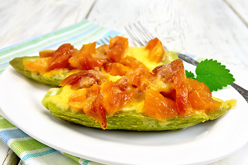 Image showing Courgettes in spicy sauce with dried apricots on towel